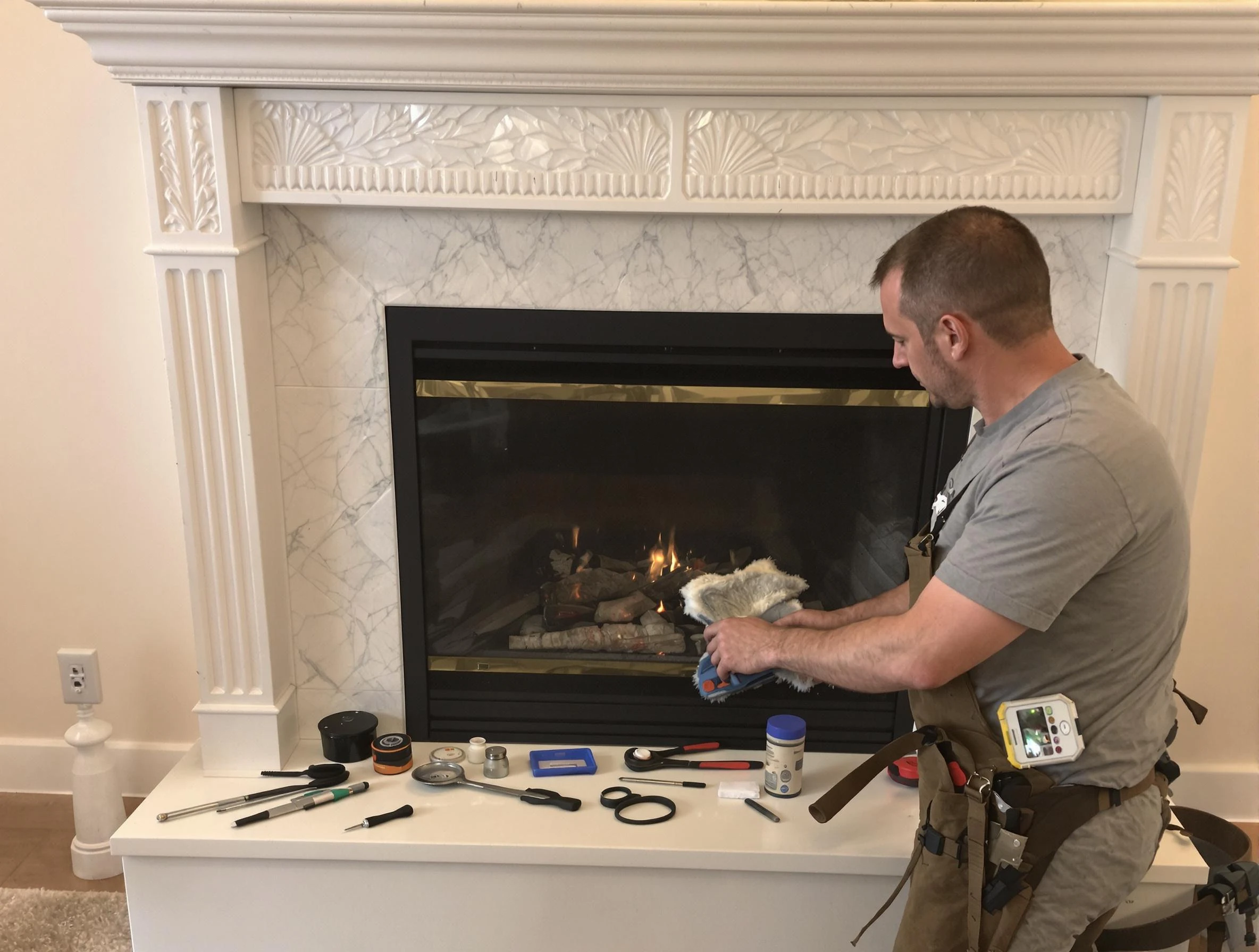 Dunwoody Chimney Sweep performing fireplace maintenance in Dunwoody, GA